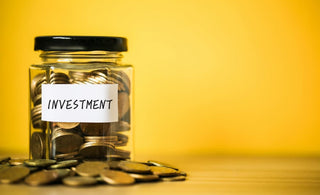 jar of coins for investing a lump sum of money
