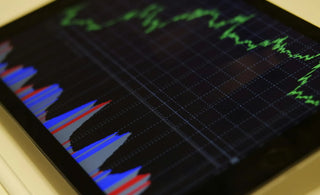 tablet displaying stocks as a long term investment in 2024.