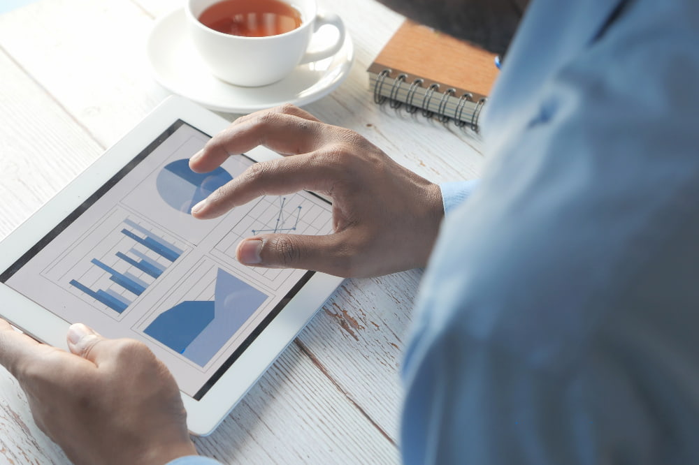 blue graph and pie chart indicating buy and hold investment