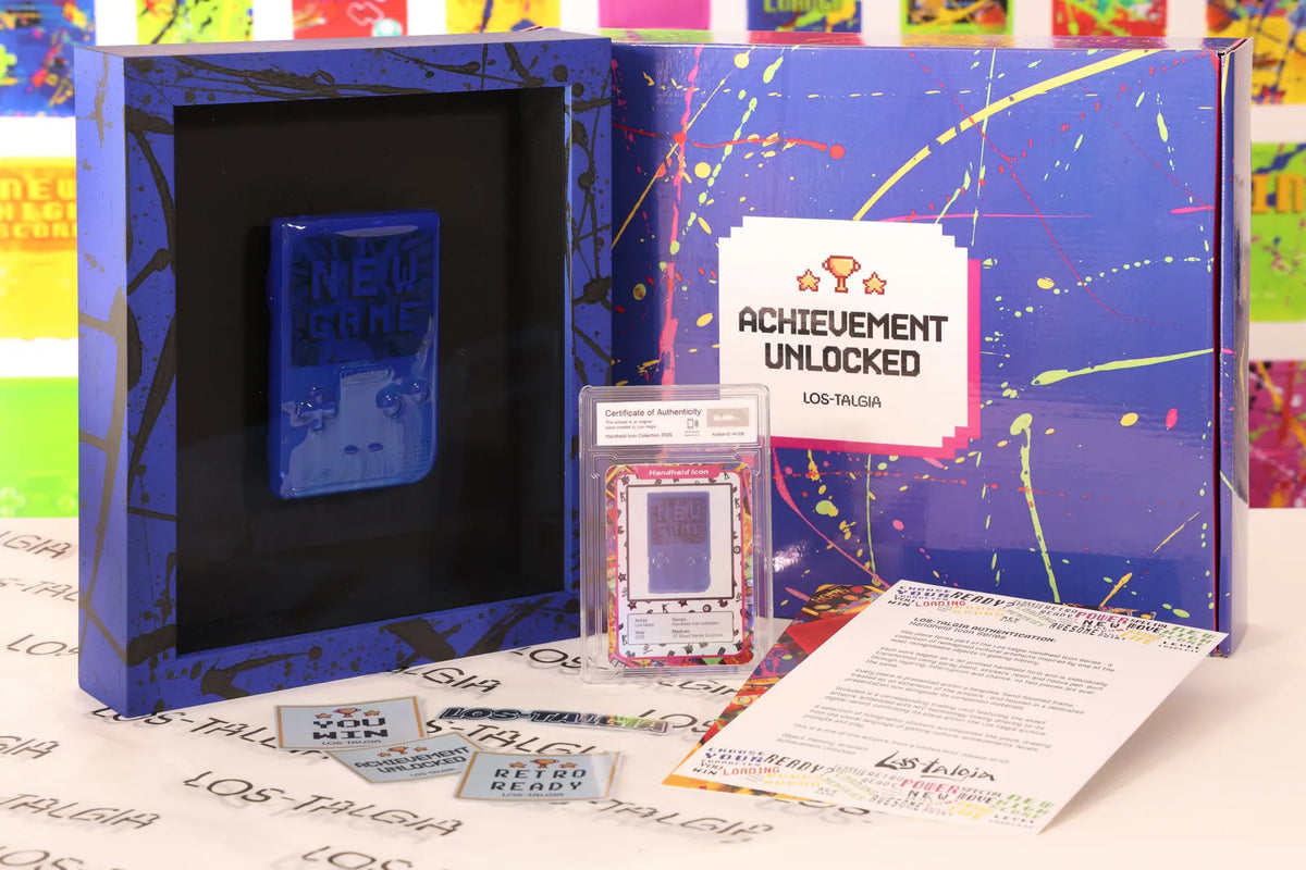 HI-026 photographed from the front: the framed piece with its certificate card, presentation box, stickers and authentication sheet.