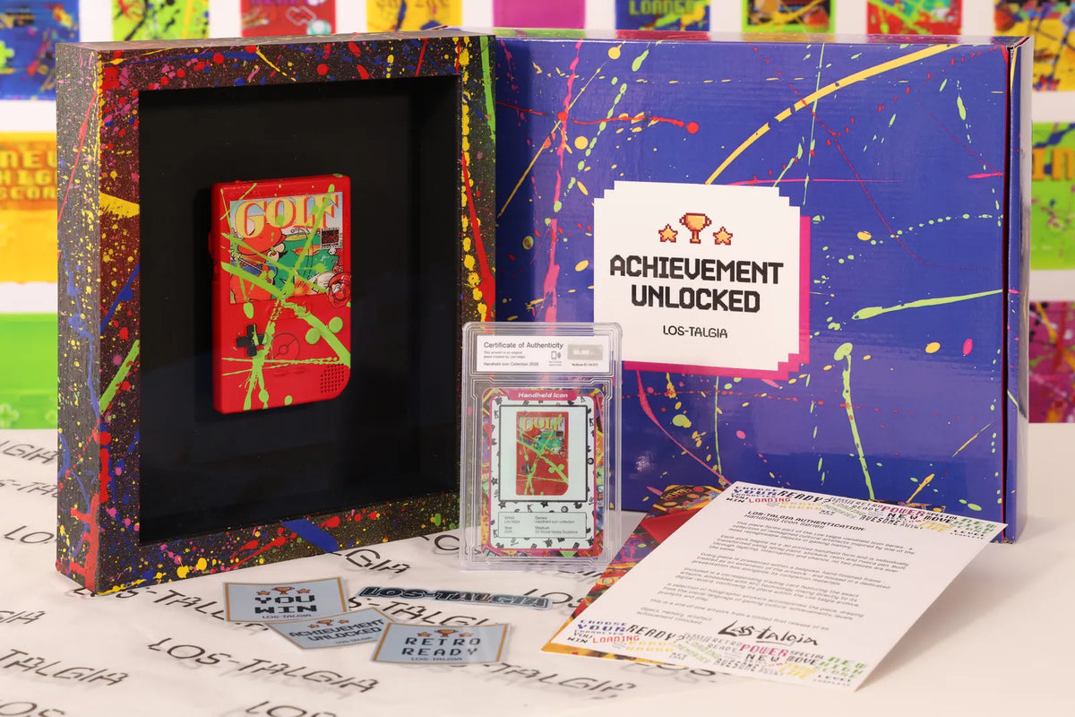 HI-011 photographed from the front: the framed piece with its certificate card, presentation box, stickers and authentication sheet.