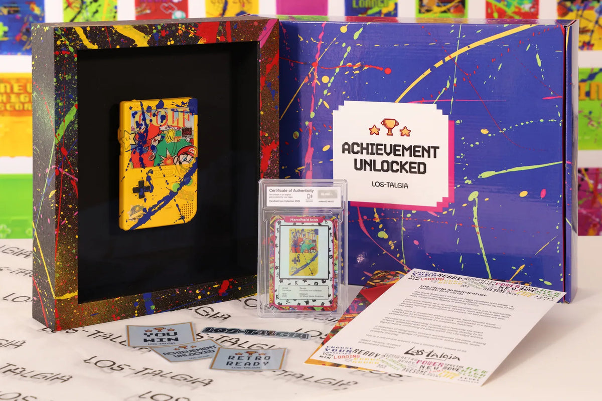 HI-012 photographed from the front: the framed piece with its certificate card, presentation box, stickers and authentication sheet.