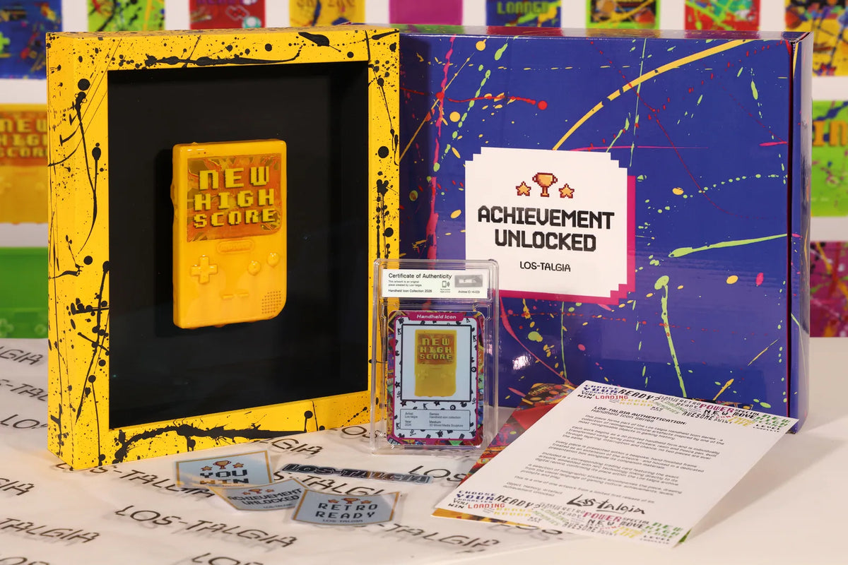 HI-029 photographed from the front: the framed piece with its certificate card, presentation box, stickers and authentication sheet.