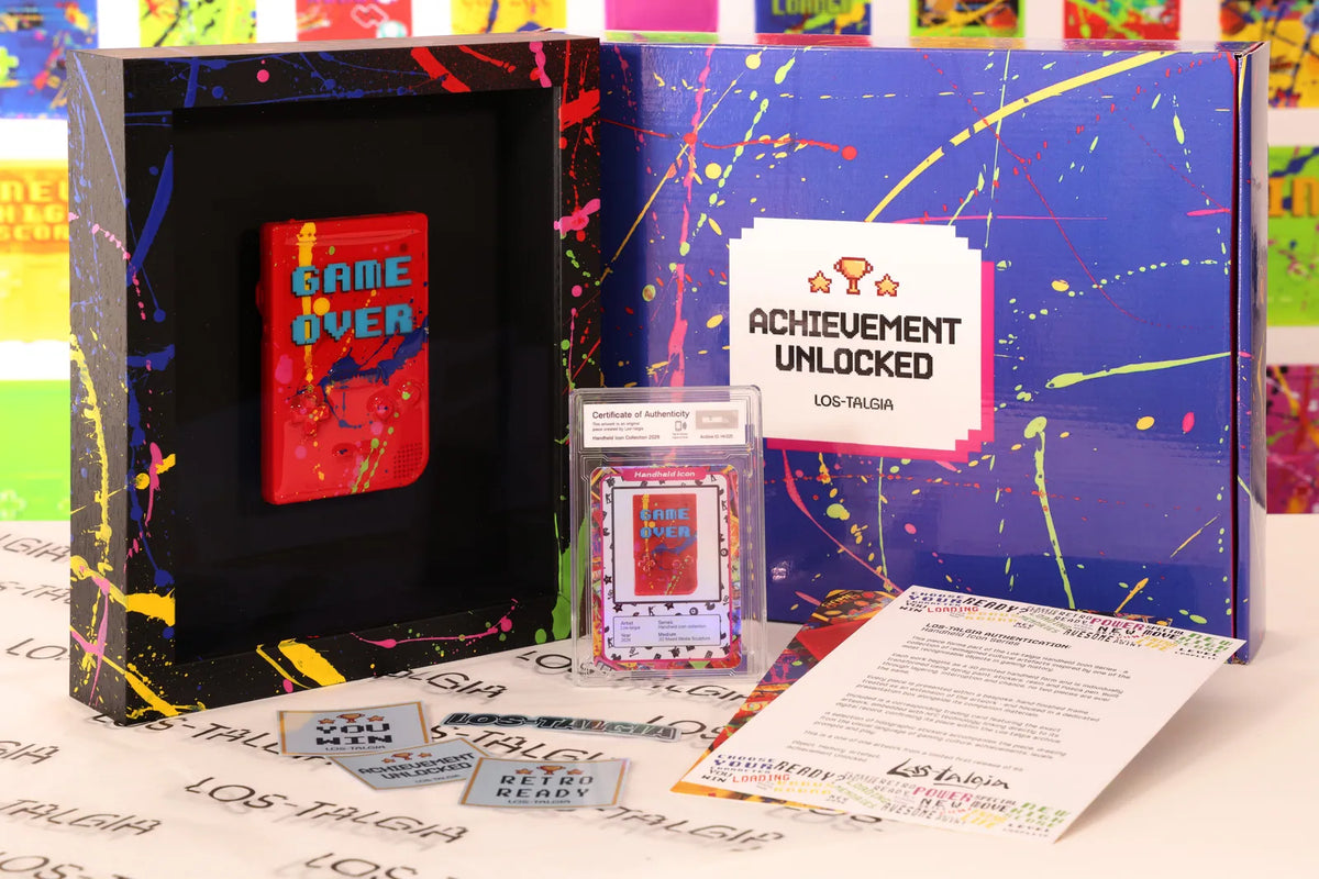 HI-025 photographed from the front: the framed piece with its certificate card, presentation box, stickers and authentication sheet.