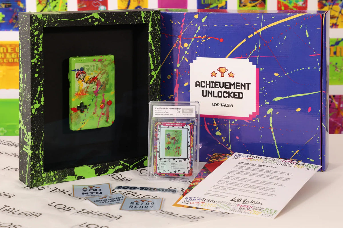 HI-008 photographed from the front: the framed piece with its certificate card, presentation box, stickers and authentication sheet.