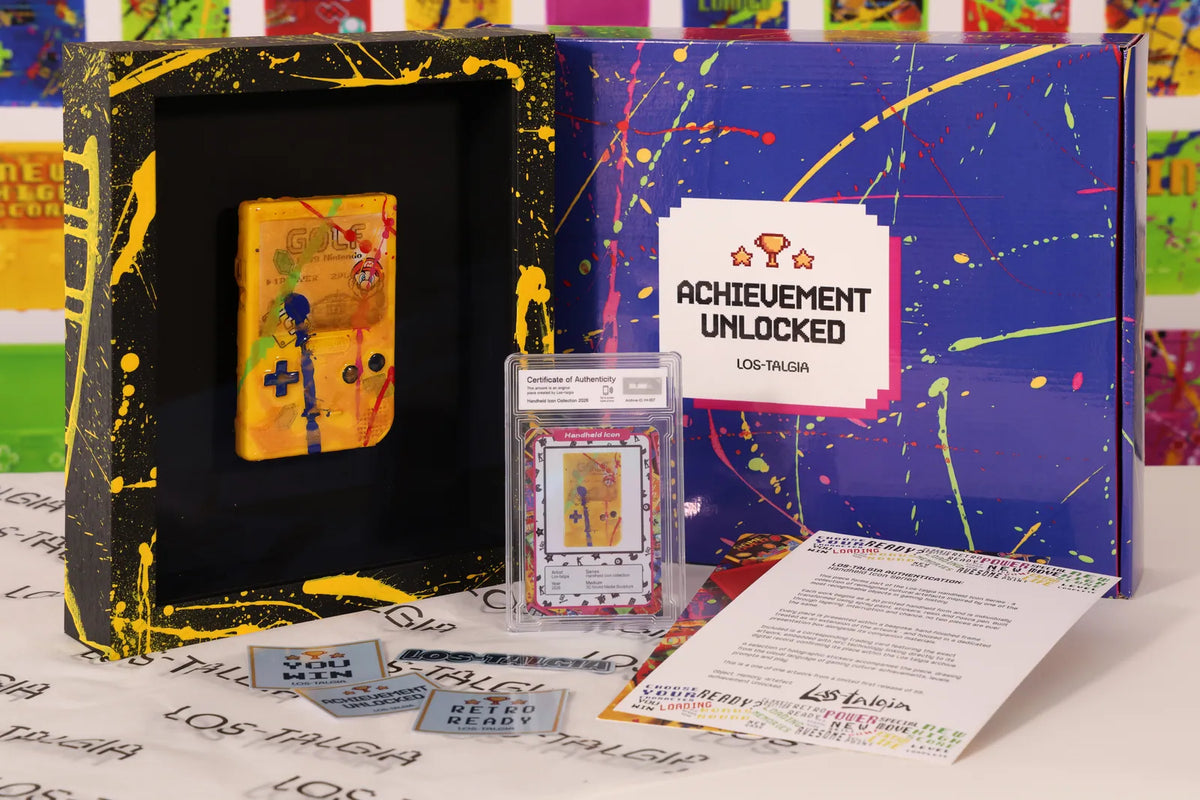 HI-007 photographed from the front: the framed piece with its certificate card, presentation box, stickers and authentication sheet.