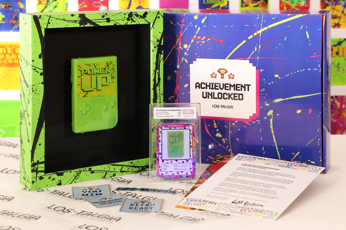 HI-028 photographed from the front: the framed piece with its certificate card, presentation box, stickers and authentication sheet.