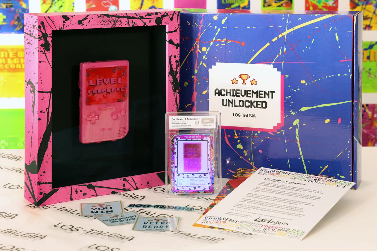 HI-027 photographed from the front: the framed piece with its certificate card, presentation box, stickers and authentication sheet.