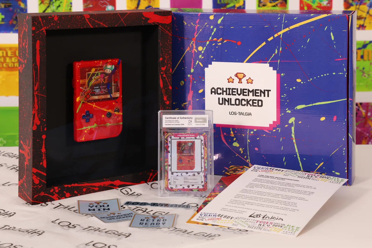HI-006 photographed from the front: the framed piece with its certificate card, presentation box, stickers and authentication sheet.